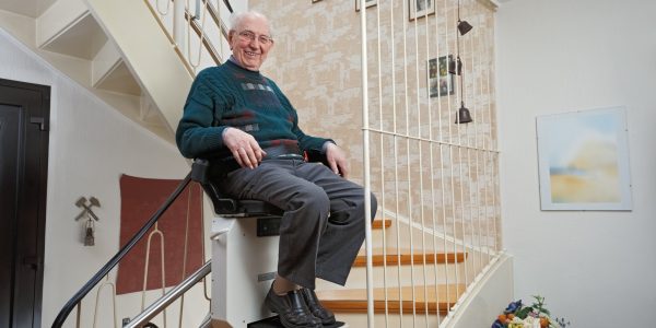 Elderly,Man,In,The,Staircase,Using,The,Stairlift