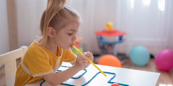 Little,Girl,Enjoying,Game,Playdough,Straw,Maze.,Great,Activity,For