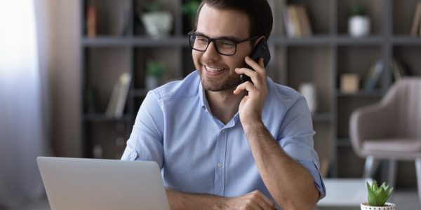 Happy,Young,Caucasian,Businessman,Sit,At,Desk,At,Home,Office