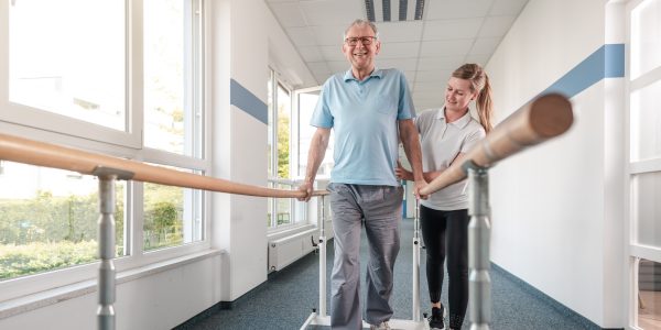 Senior,Patient,And,Physical,Therapist,In,Rehabilitation,Walking,Exercises