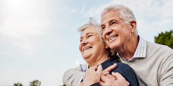 Sky,,Elderly,Couple,And,Hug,Outdoors,Or,Happy,In,Retirement