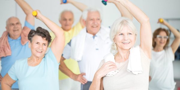 Seniors,Doing,Strength,Building,Fitness,Exercises,With,Dumbbells,,Holding,Their